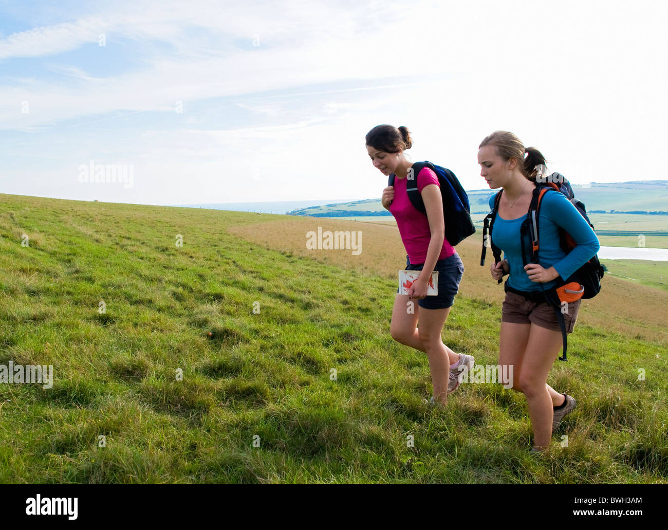 Two young female hikers map hi-res stock photography and images - Alamy