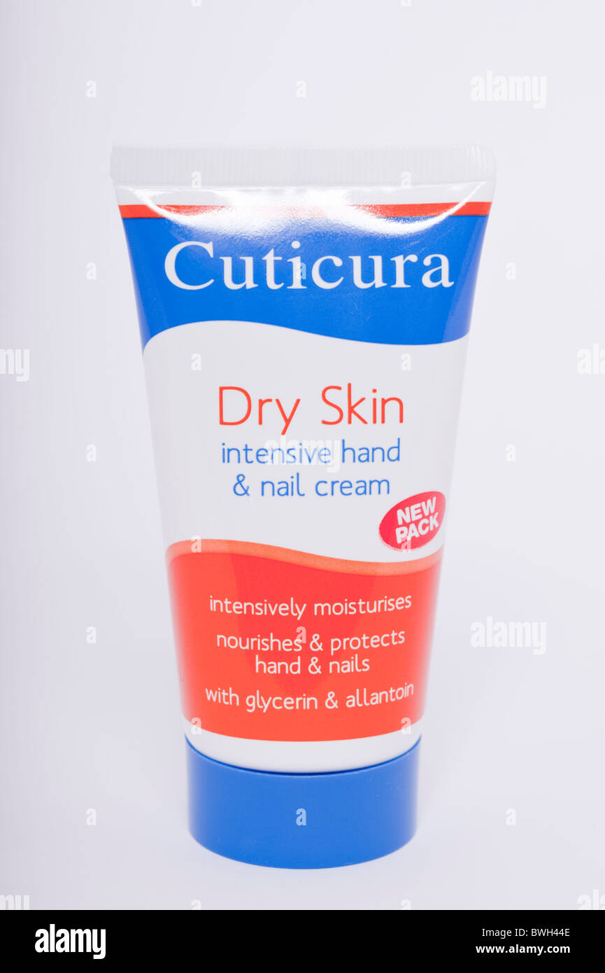 A tube of Cuticura hand and nail cream for dry skin on a white