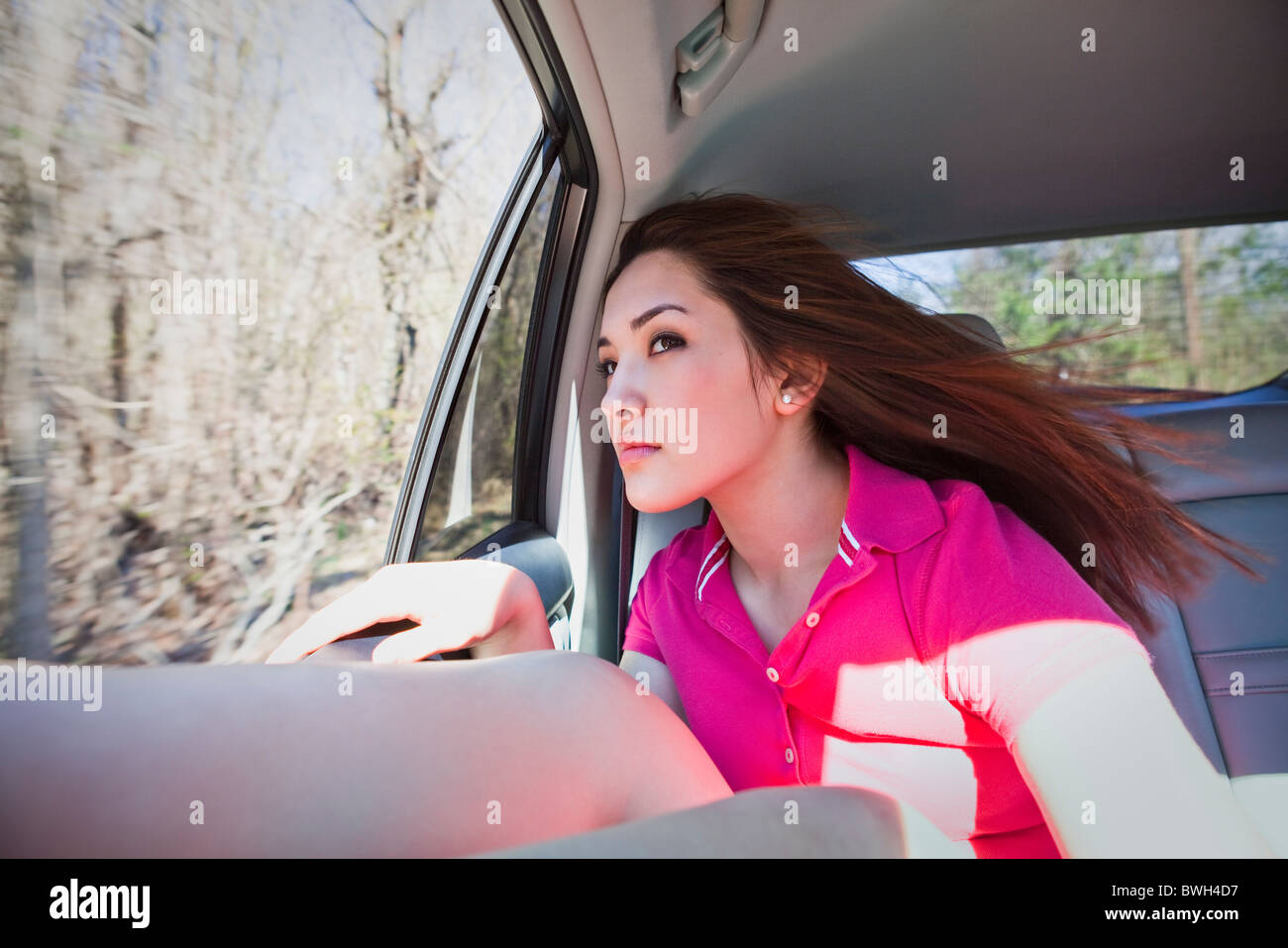 Girl in car Stock Photo - Alamy