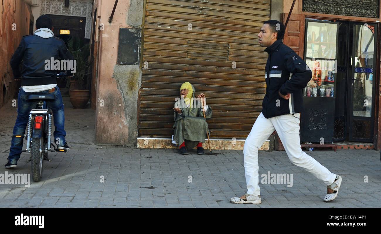 Marrakesh Morocco 2010 - Old lady begging in the Medina or old walled city of Marrakech Morocco Stock Photo