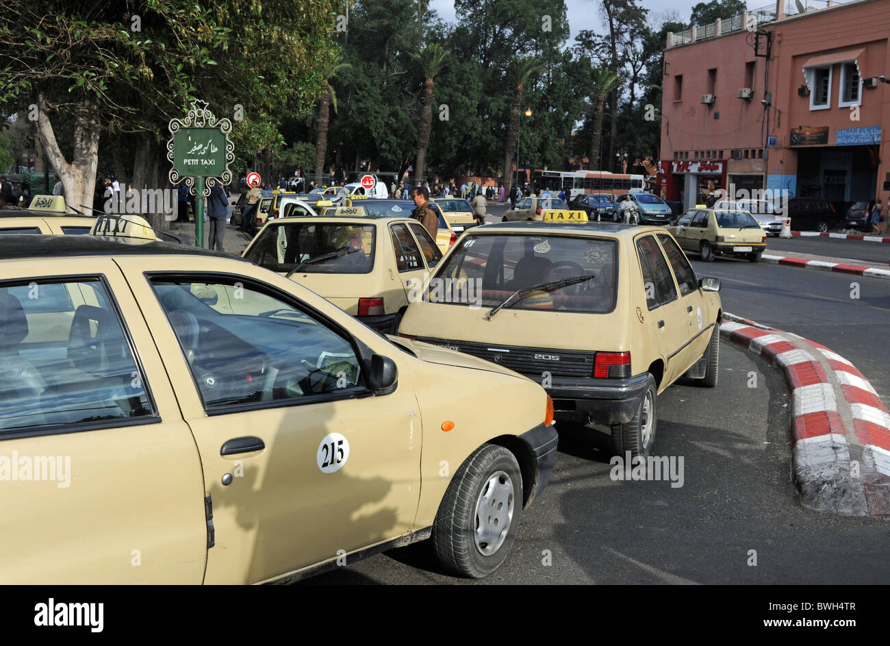 Marrakesh Morocco - Petit taxis lined up at a rank in the centre of Marrakech Morocco Stock Photo
