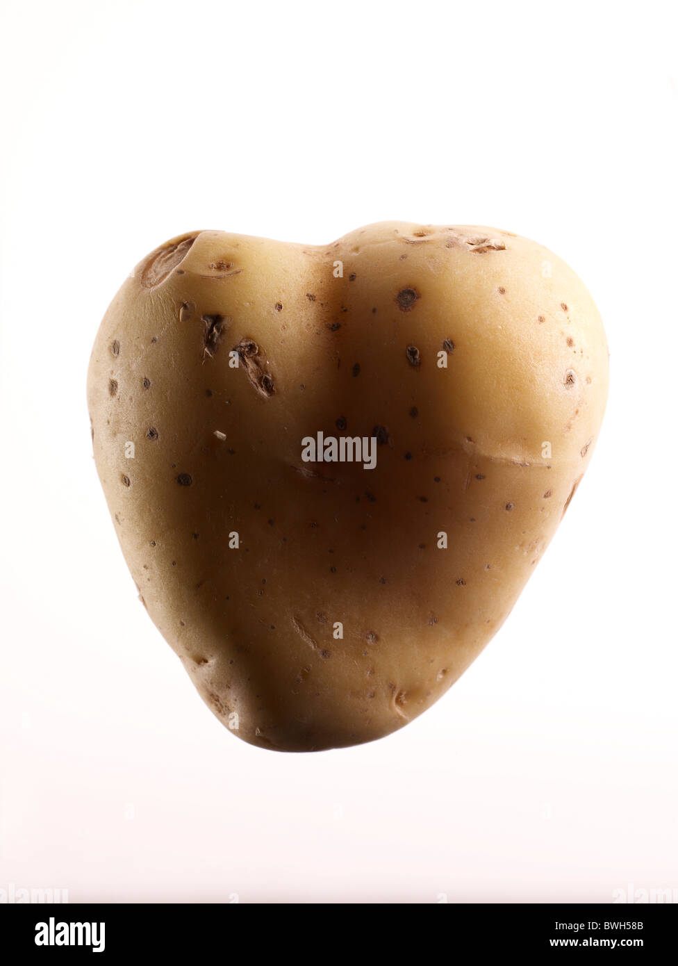 Heart-shaped potato Stock Photo - Alamy