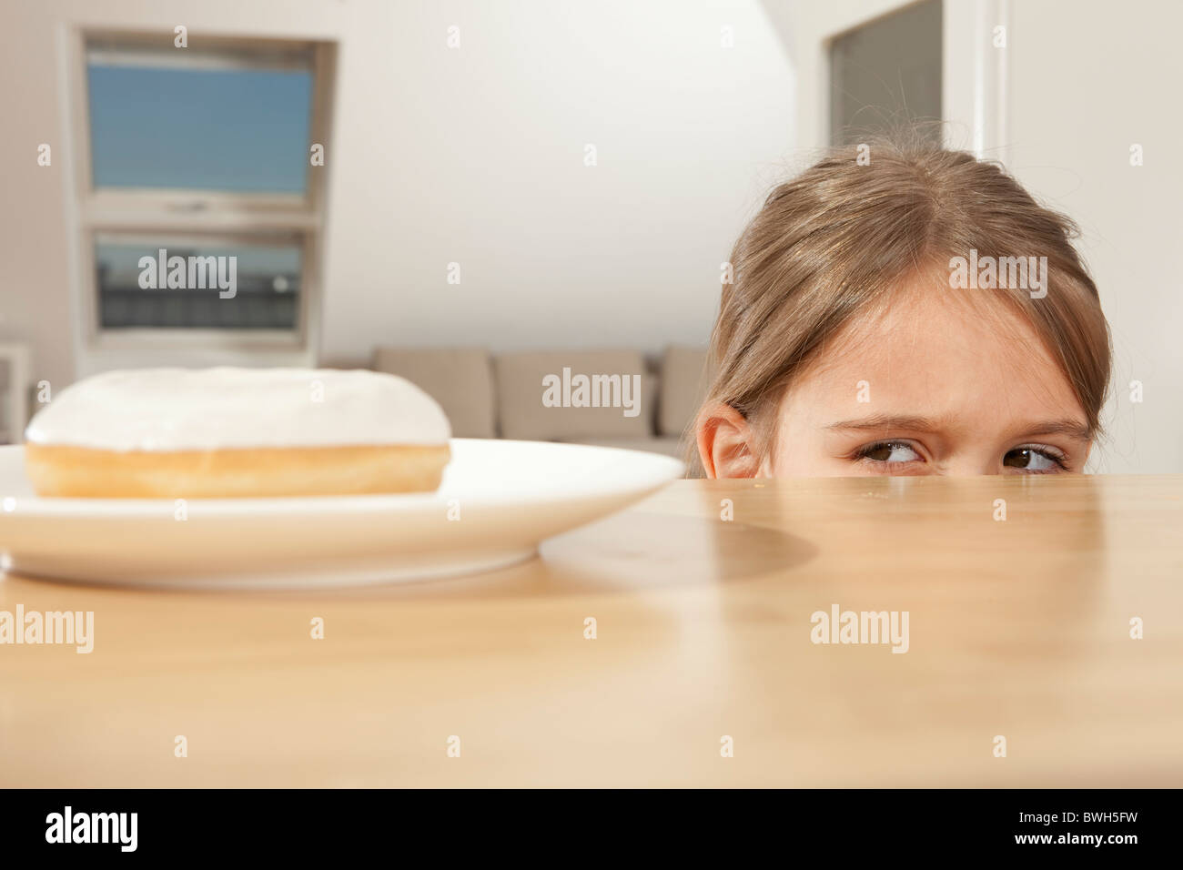 LIttle girl wants a piece of cake Stock Photo Alamy