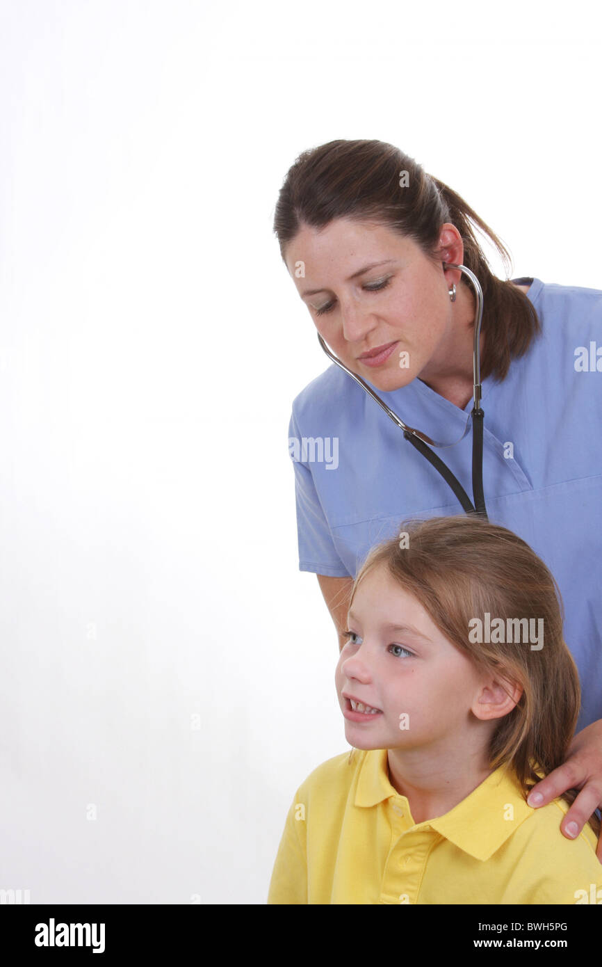 A young doctor using a stethoscope on a child to hear her lungs while