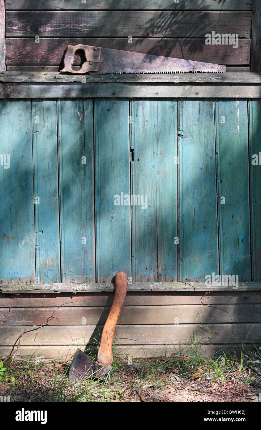 Old hand tools saw and axe Stock Photo Alamy