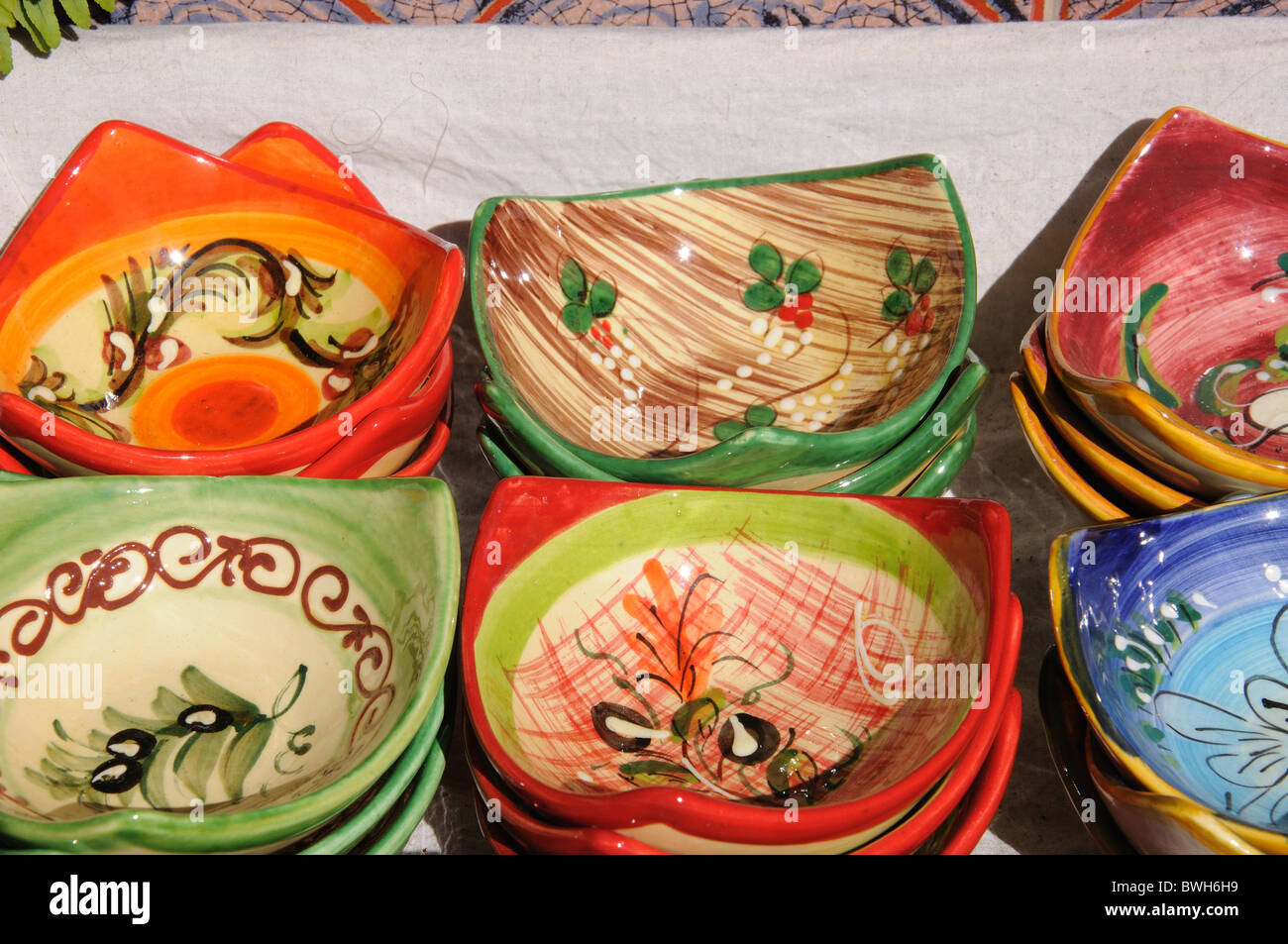 Pretty ceramic dishes displayed outside a shop, Mijas, Costa del Sol, Malaga Province, Andalucia