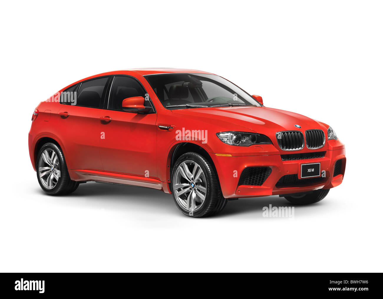 License available at MaximImages.com - Red 2011 BMW X6 M crossover. Isolated car on white background with clipping path. Stock Photo