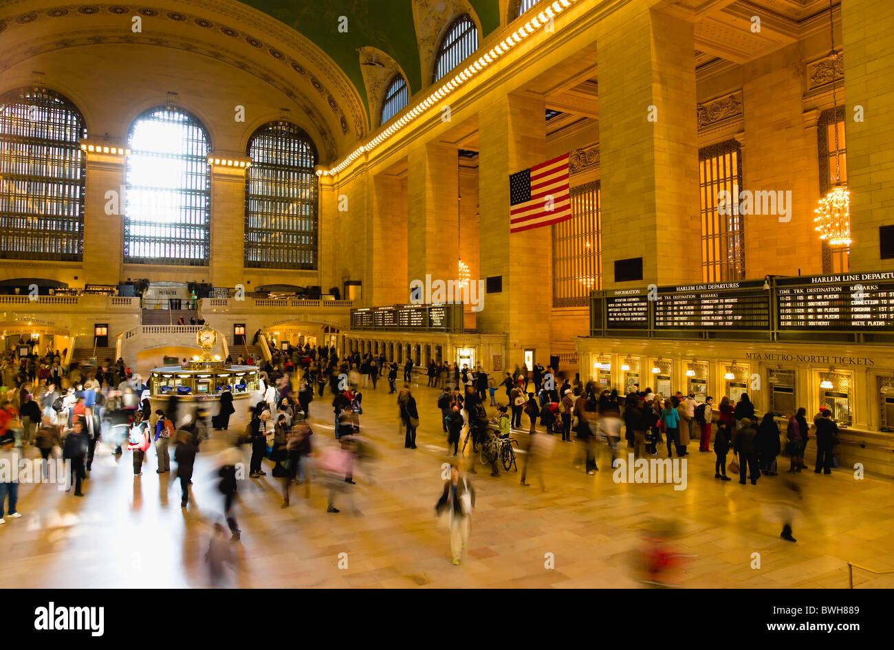 USA New York Manhattan NYC Grand Central Terminal railway station with people walking in Main Concourse and buying tickets Stock Photo