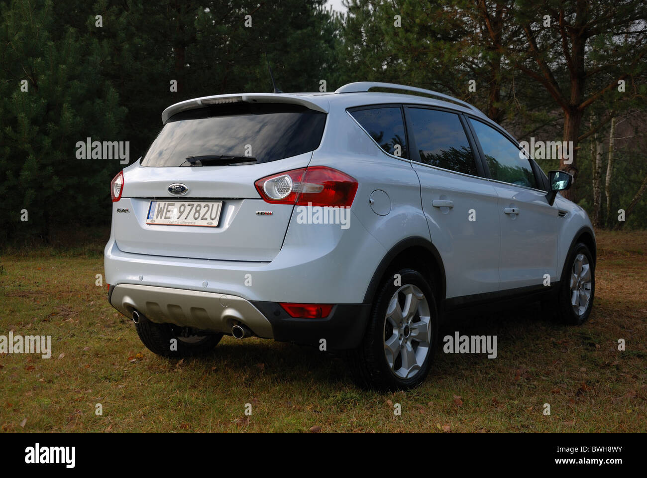 Second generation Ford Kuga SUV, black metallic color, panoramic ceiling,  4x4 traction, automatic transmission, isolated in an empty parking lot  Stock Photo - Alamy