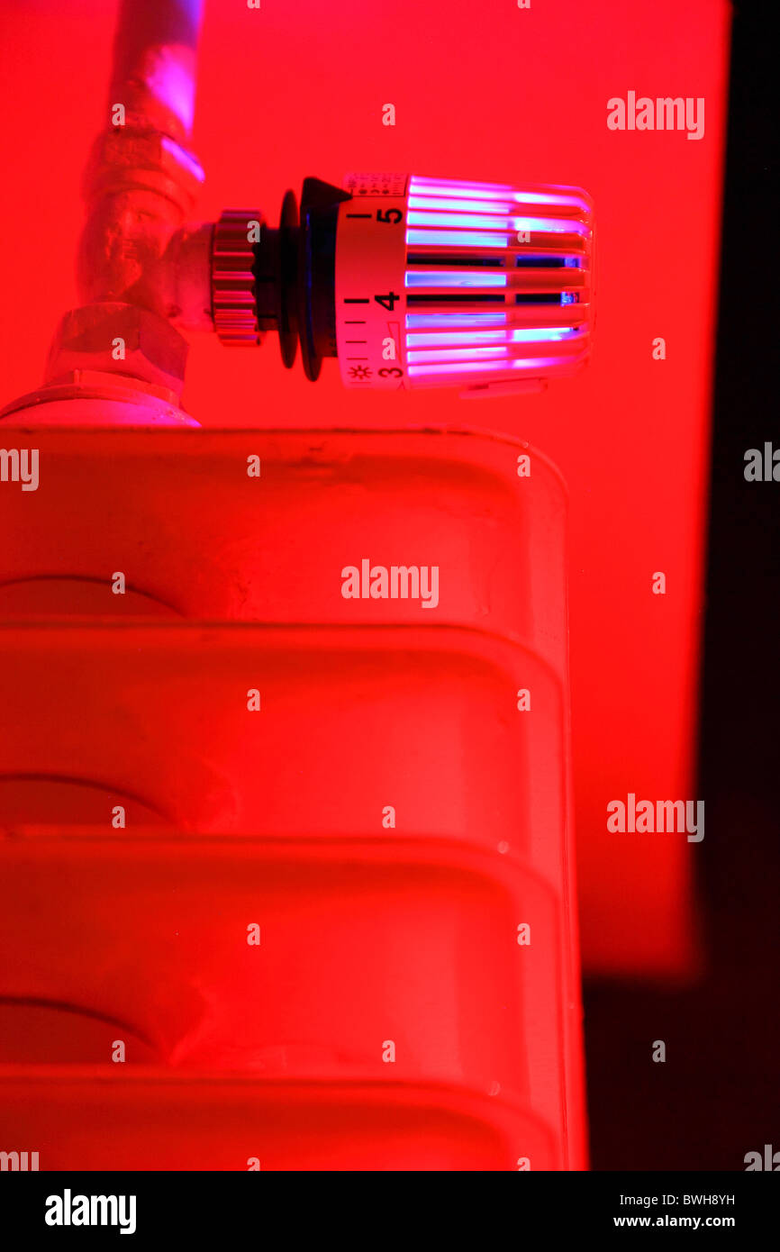 Illuminated radiator, thermostat, central heating in a private house