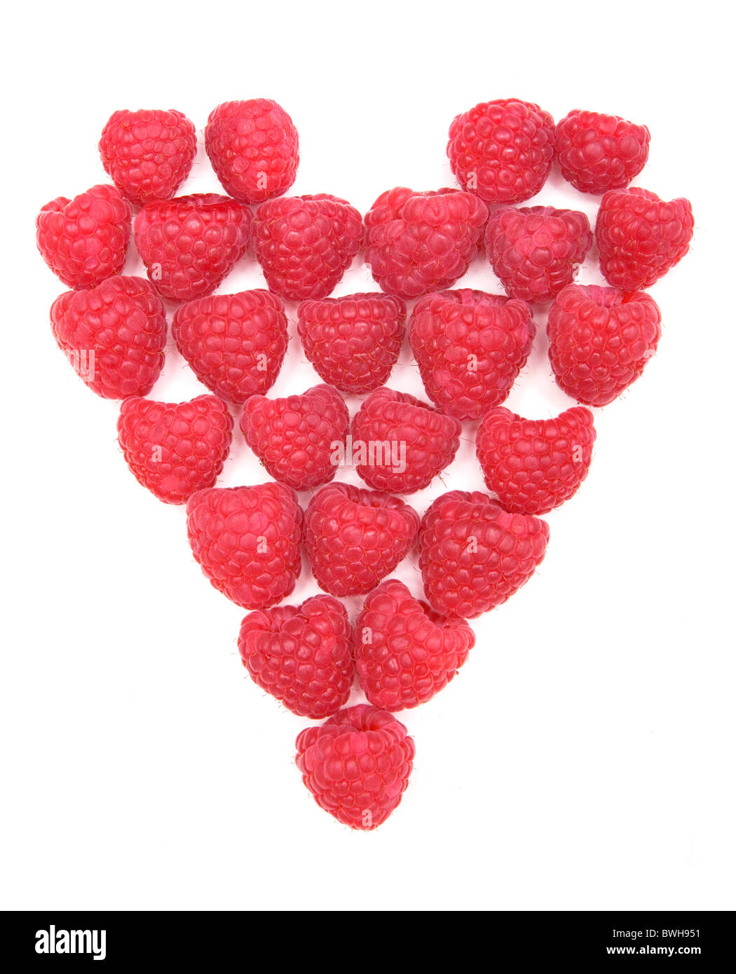 Raspberries formed into Heart Shape - A Healthy Diet Stock Photo