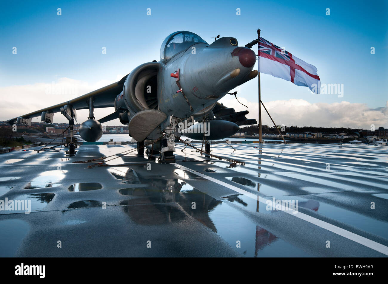 A Bae Harrier jump jet on the flight deck of the British aircraft carrier HMS Ark Royal Stock Photo