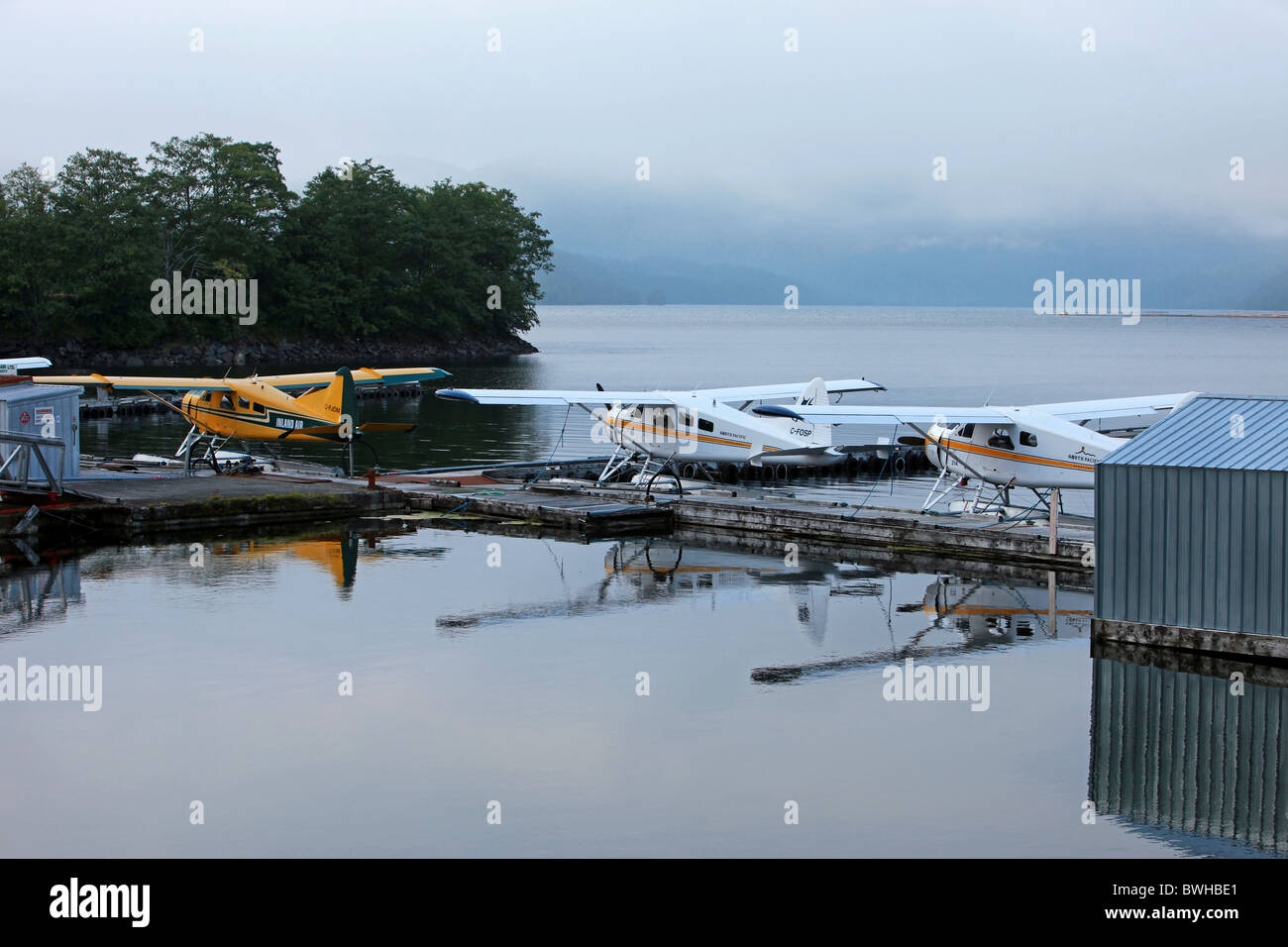 Seaplanes at dock in marina Skagway, Alaska Stock Photo