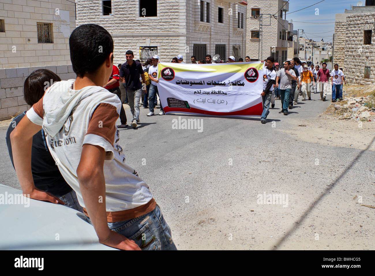 Palestinian people demonstrating against the extension of the apartheid wall near Al Masara, Palestine Stock Photo