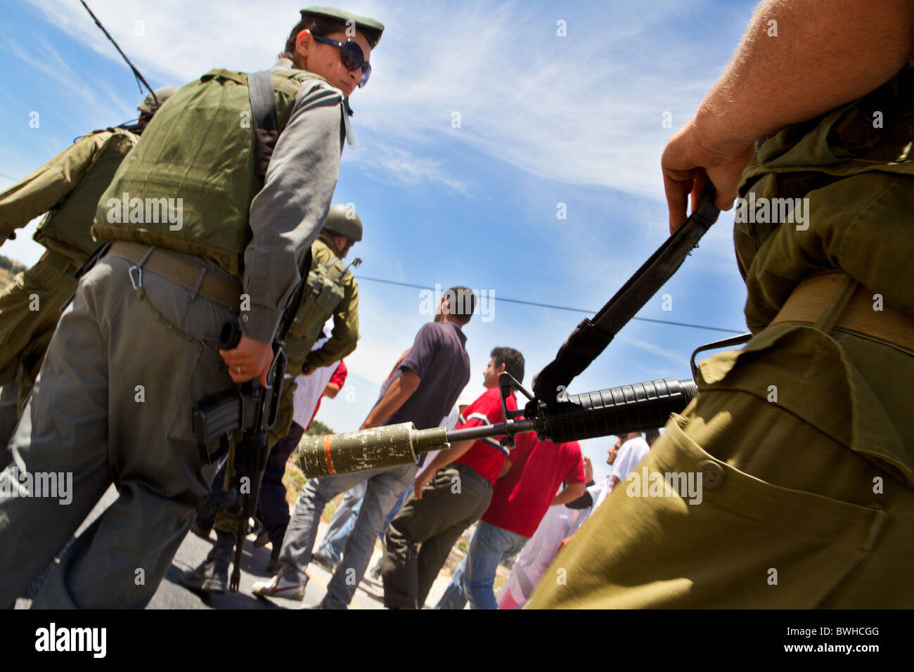 Palestinian people demonstrating against the extension of the apartheid wall near Al Masara, Palestine Stock Photo