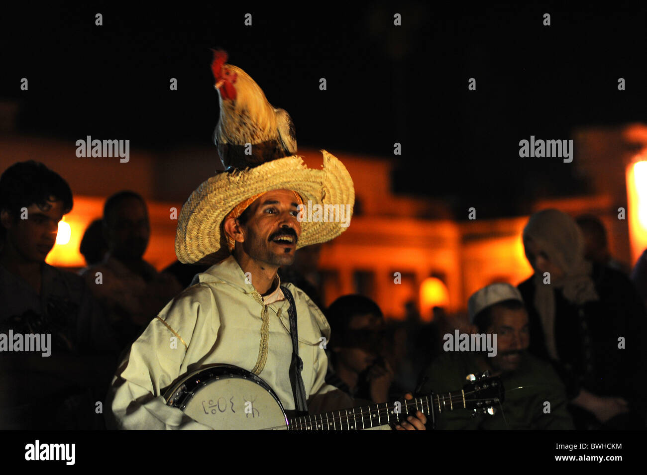 Performance of traditional Moroccan folksong in the main square in Djemaa el Fna, Marrakesh. Stock Photo