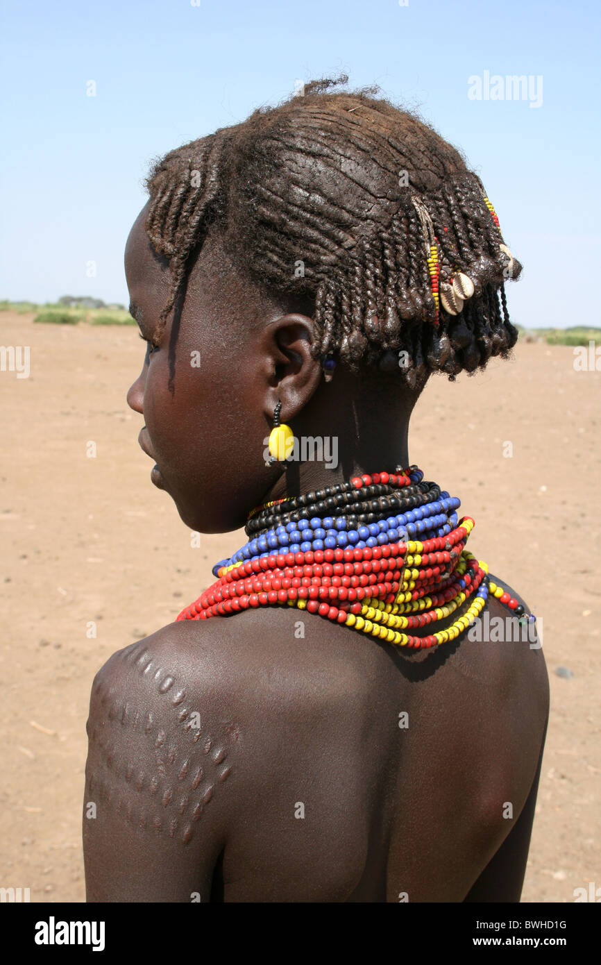Hairstyle And Tribal Scarring On A Dassanech Tribe Girl, Omorate, Omo Valley, Ethiopia Stock Photo