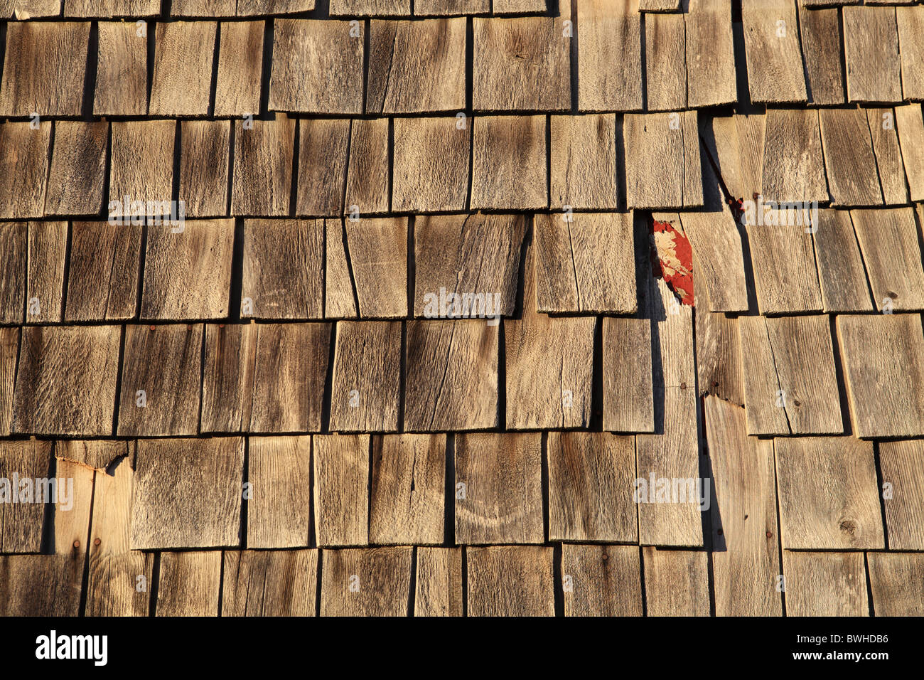 Damaged wooden shingles on a Craigville Beach wooden building, Barnstable, Cape Cod, Massachusetts, USA Stock Photo