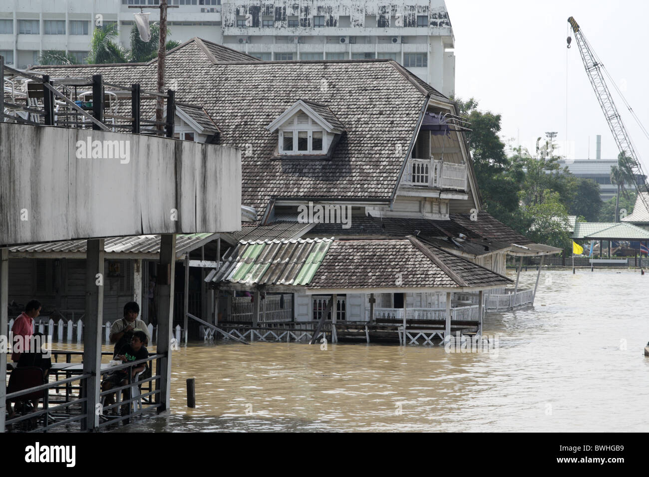 Old house in flood water , Chao Phraya river , Bangkok Stock Photo