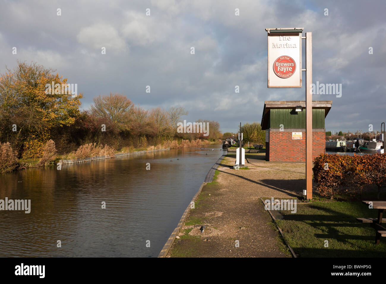 Sign for "The Marina" a canalside Brewers Fayre pub in the winter