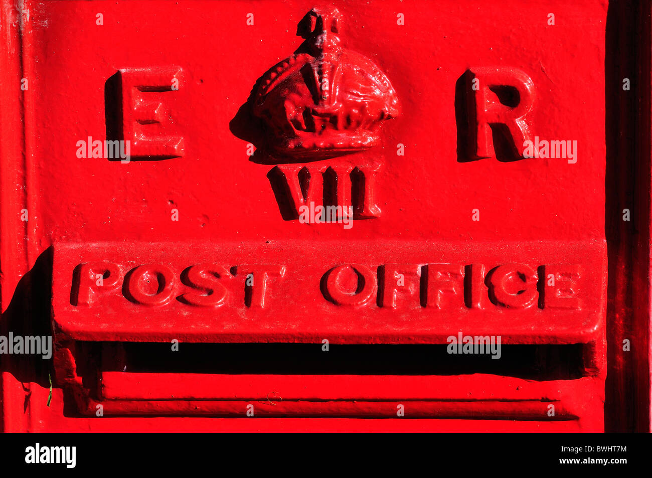 An ER  red Royal Mail post box. October 2010 Stock Photo