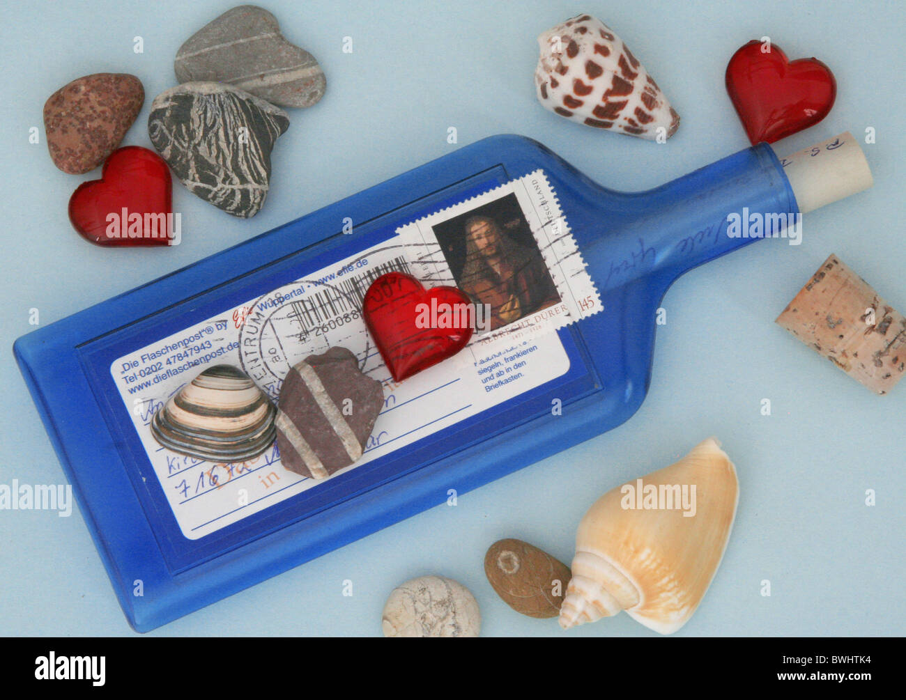bottle post greetings letter stamp written writing write writing ...
