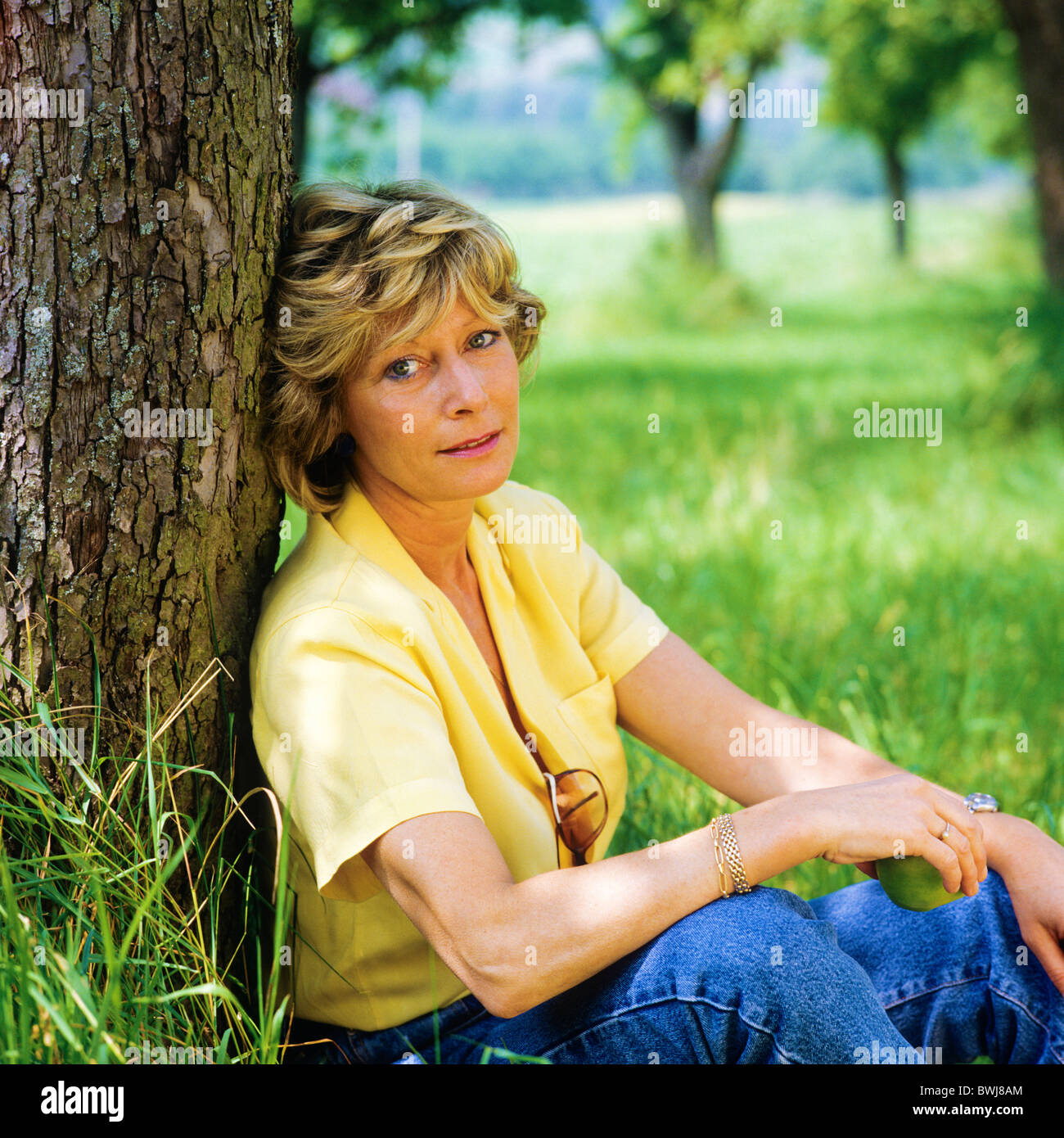 MR MATURE WOMAN PORTRAIT IN GARDEN Stock Photo - Alamy