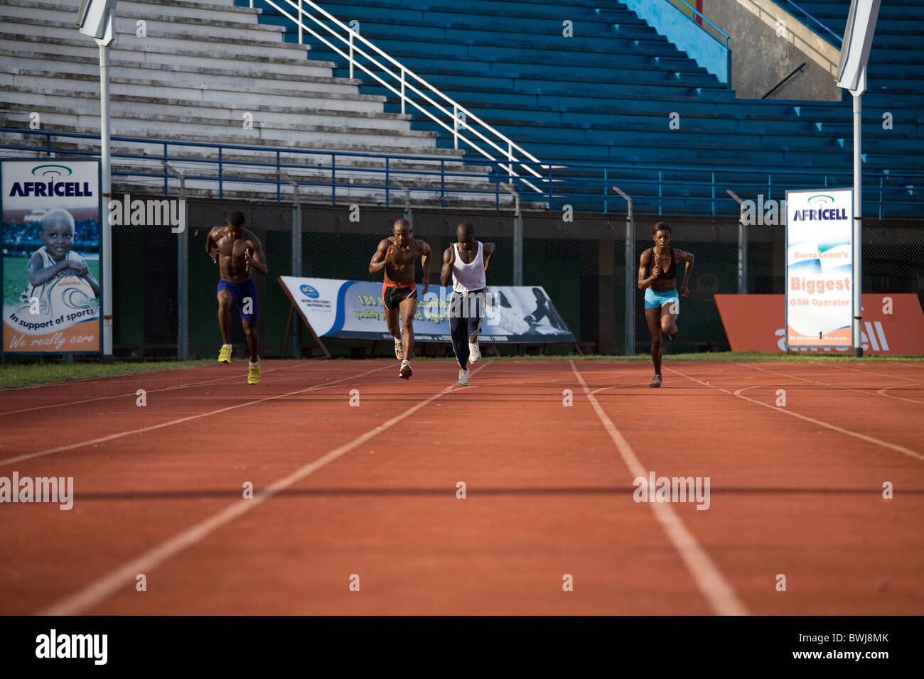Sarah Bona fastest woman in Sierra Leone West Africa and male athletes International Sports Stadium in Freetown Sierra Leone Stock Photo
