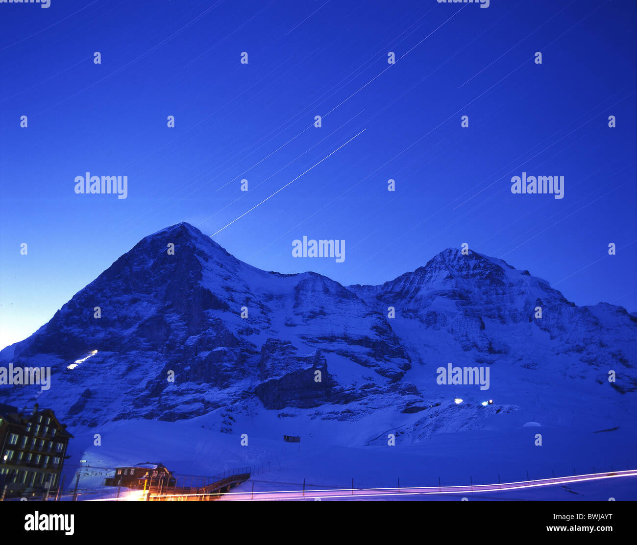 star sky star Kleine Scheidegg Eiger Monch time exposure mountains alps winter snow Bernese Oberland Canton Stock Photo
