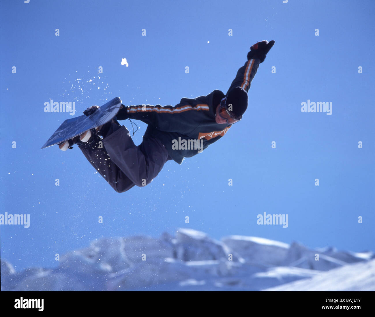 snowboard Snowboarder action jump Snowboarding winter sports winter mountains Switzerland Europe sport Stock Photo