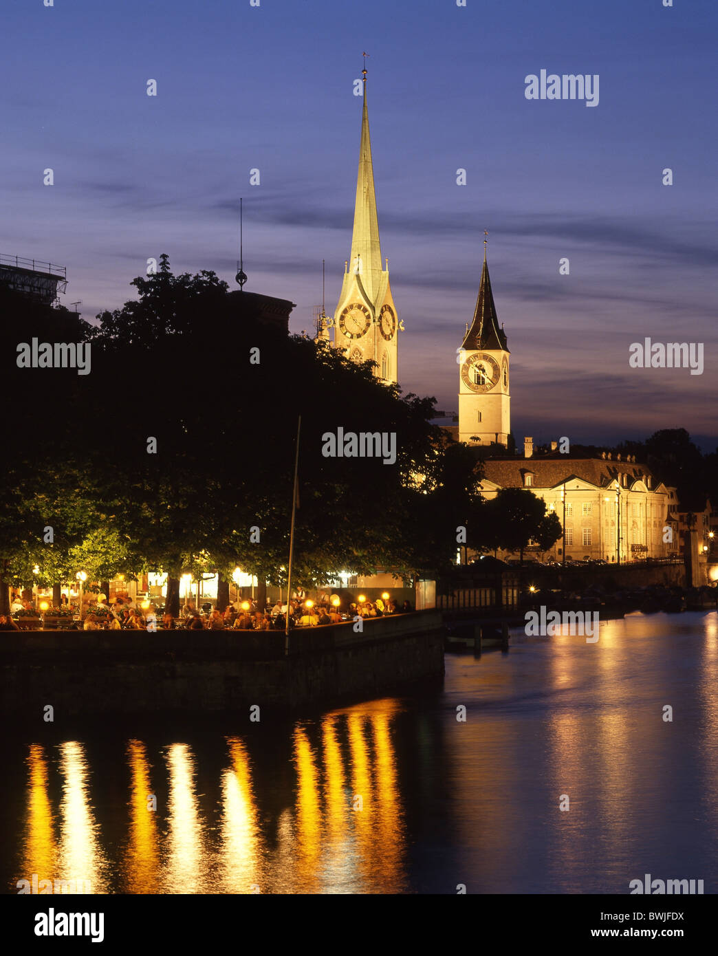 Zurich town city at night night Limmat Bauschanzli Saint Peter Fraumunster Switzerland Europe Stock Photo