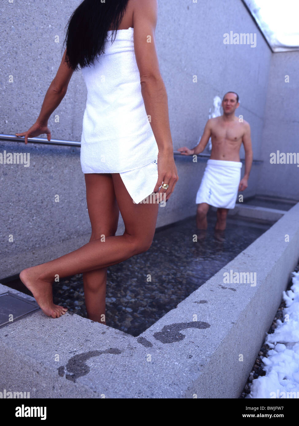 taking a Kneipp cure Wellness water brook stream body health woman man Kneipp cure bathing bath Bad Sedr Stock Photo
