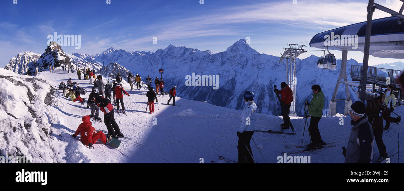 Lotschental mountain station Hockenhorn skiing area winter sports person skier Snowboarder ski snowboard sce Stock Photo