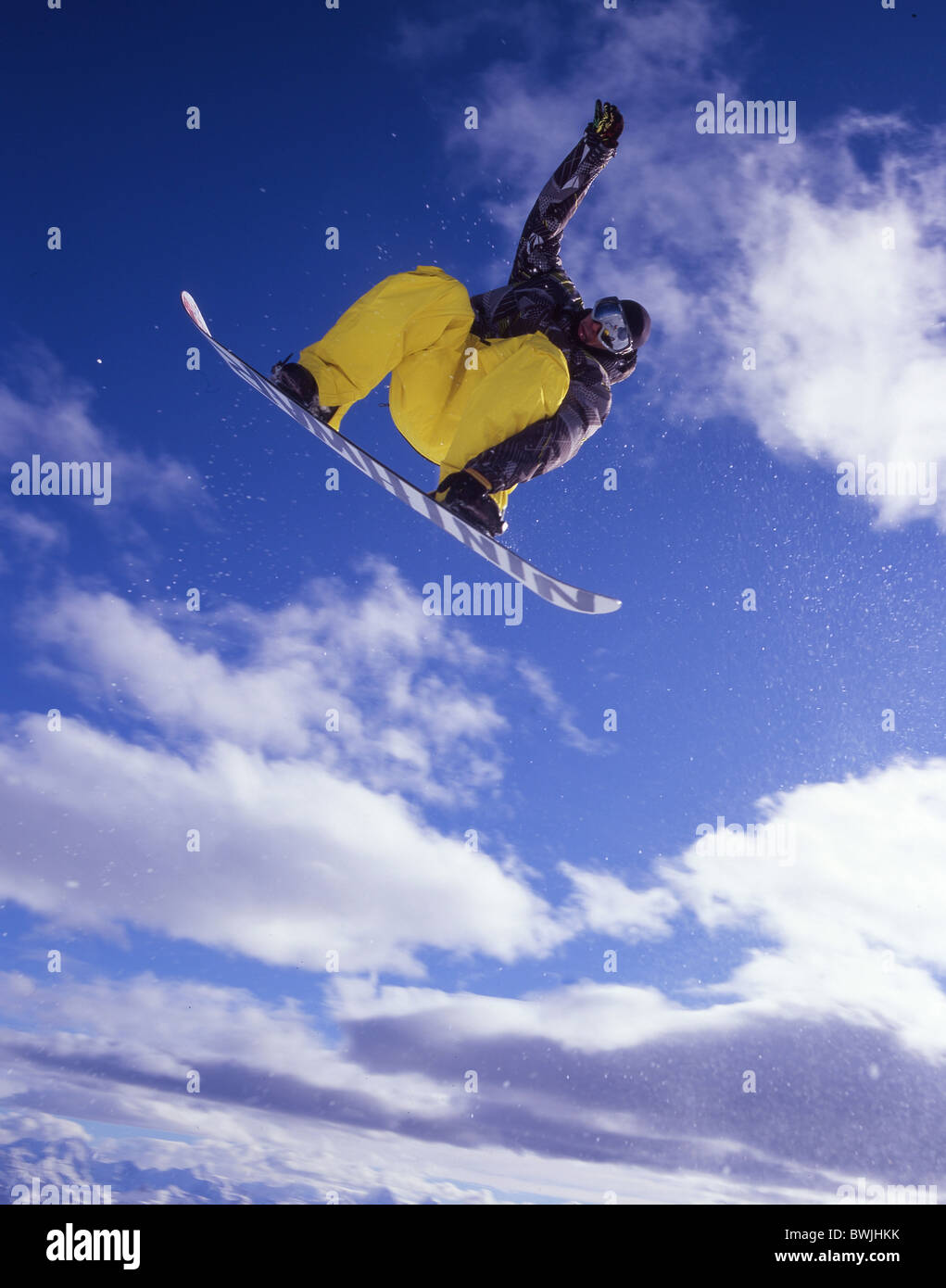 Snowboarder jump action sky snowboard Snowboarding winter sports winter mountains Alps Glacier 3000 Les Dia Stock Photo