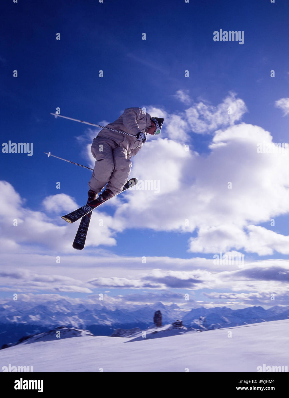 Free skingi ski jump action sky winter sports winter mountains Alps Glacier 3000 Les Diablerets canton Vaud Stock Photo