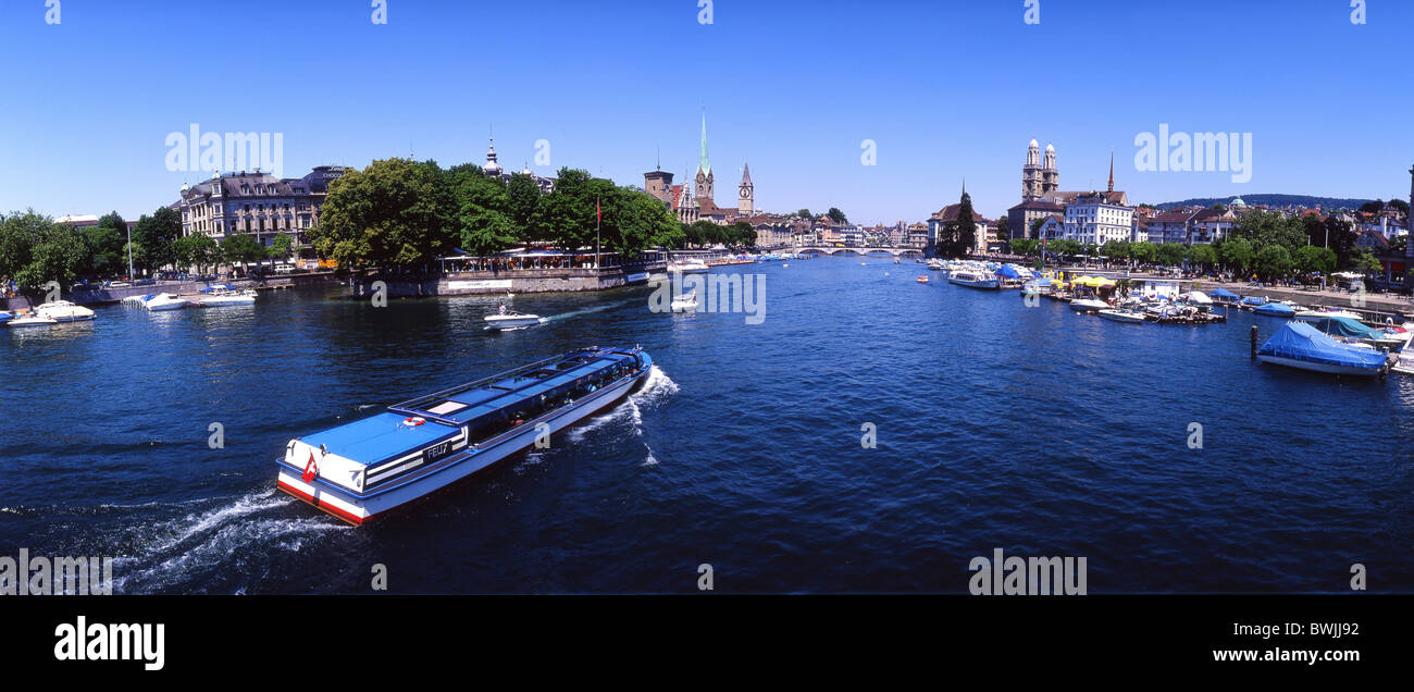 town city of Zurich panorama Limmat Limmatschiff ship boats Bauschanzli churches Switzerland Europe Stock Photo