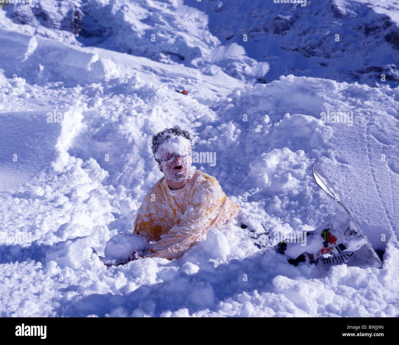 fall man overthrown snow snowboard Snowboarding Snowboarder Snowboard winter winter sports sports humor Stock Photo