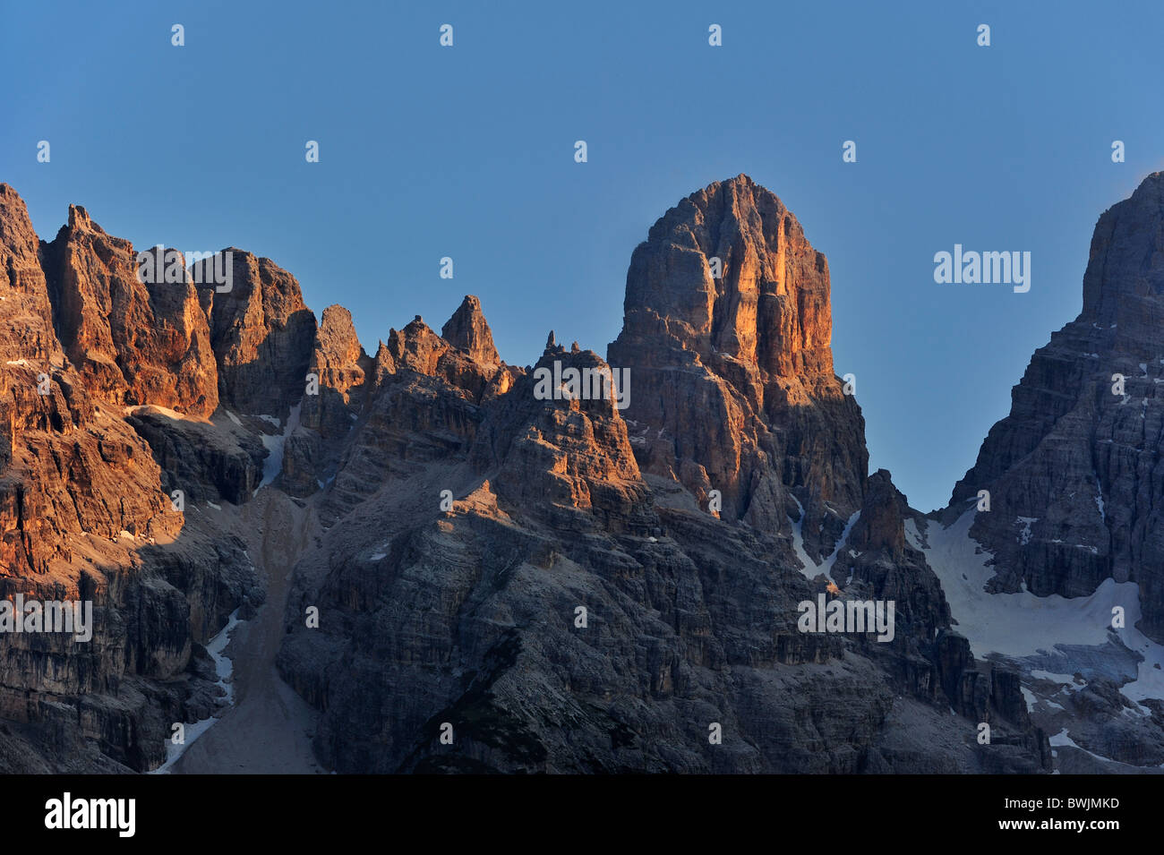 Alpenglow at sunset over the mountain Monte Cristallo in the Dolomites, Italy Stock Photo