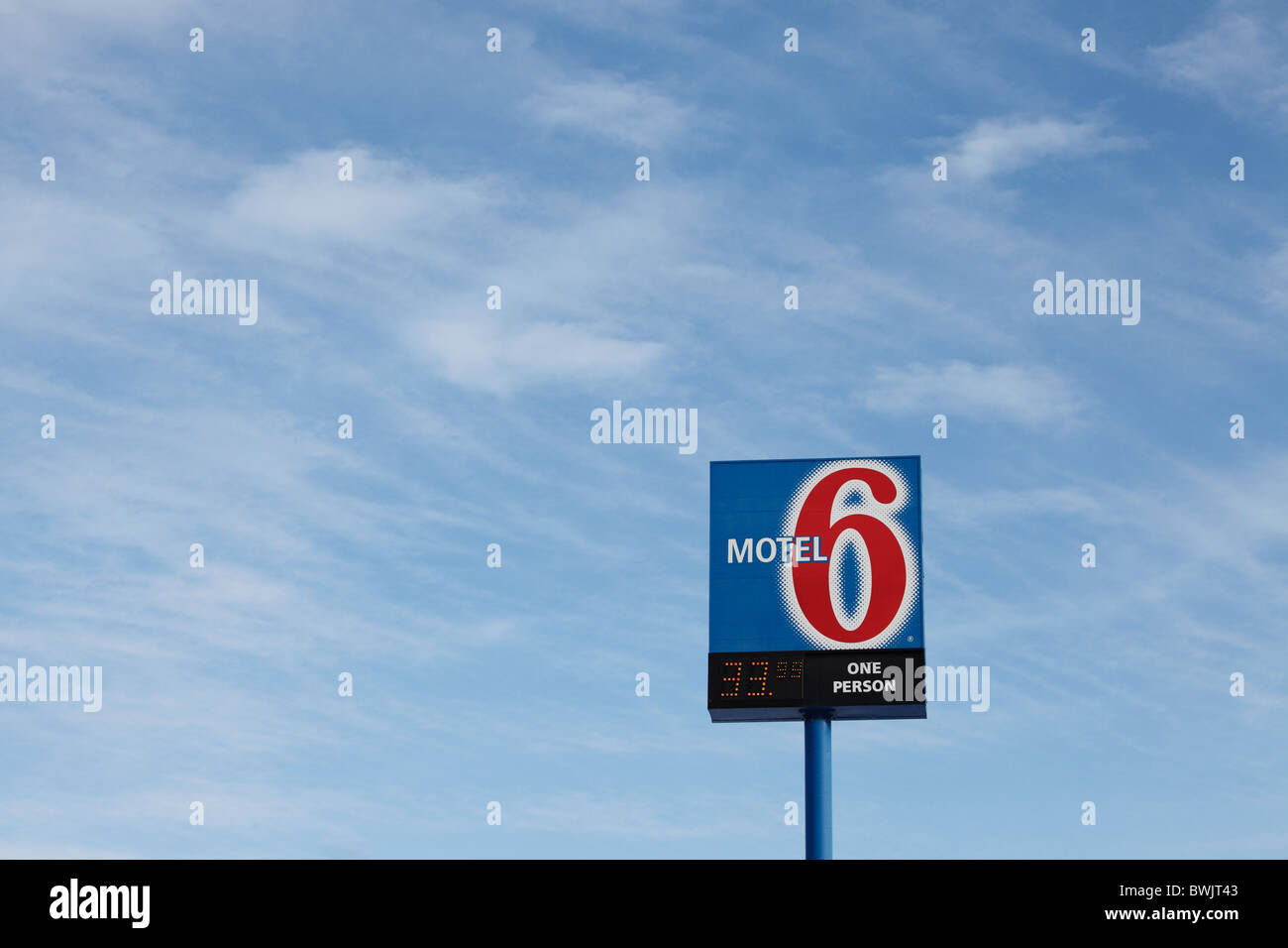A Motel 6 sign advertising room rates for $33.99 per night - USA. Stock Photo