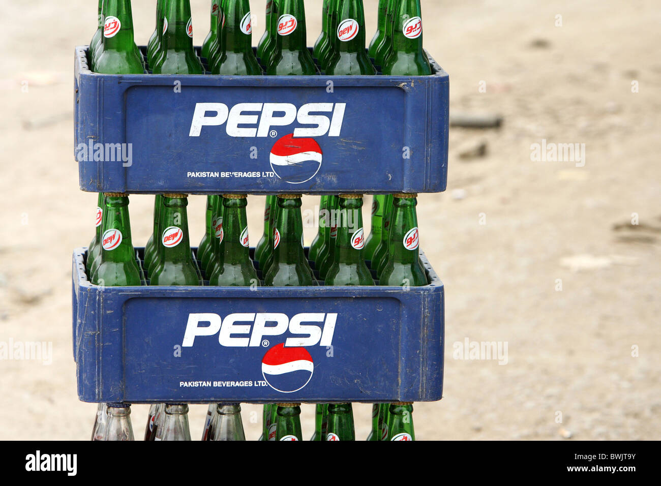 Piled Pepsi crates filled with bottles, Karachi, Pakistan Stock Photo
