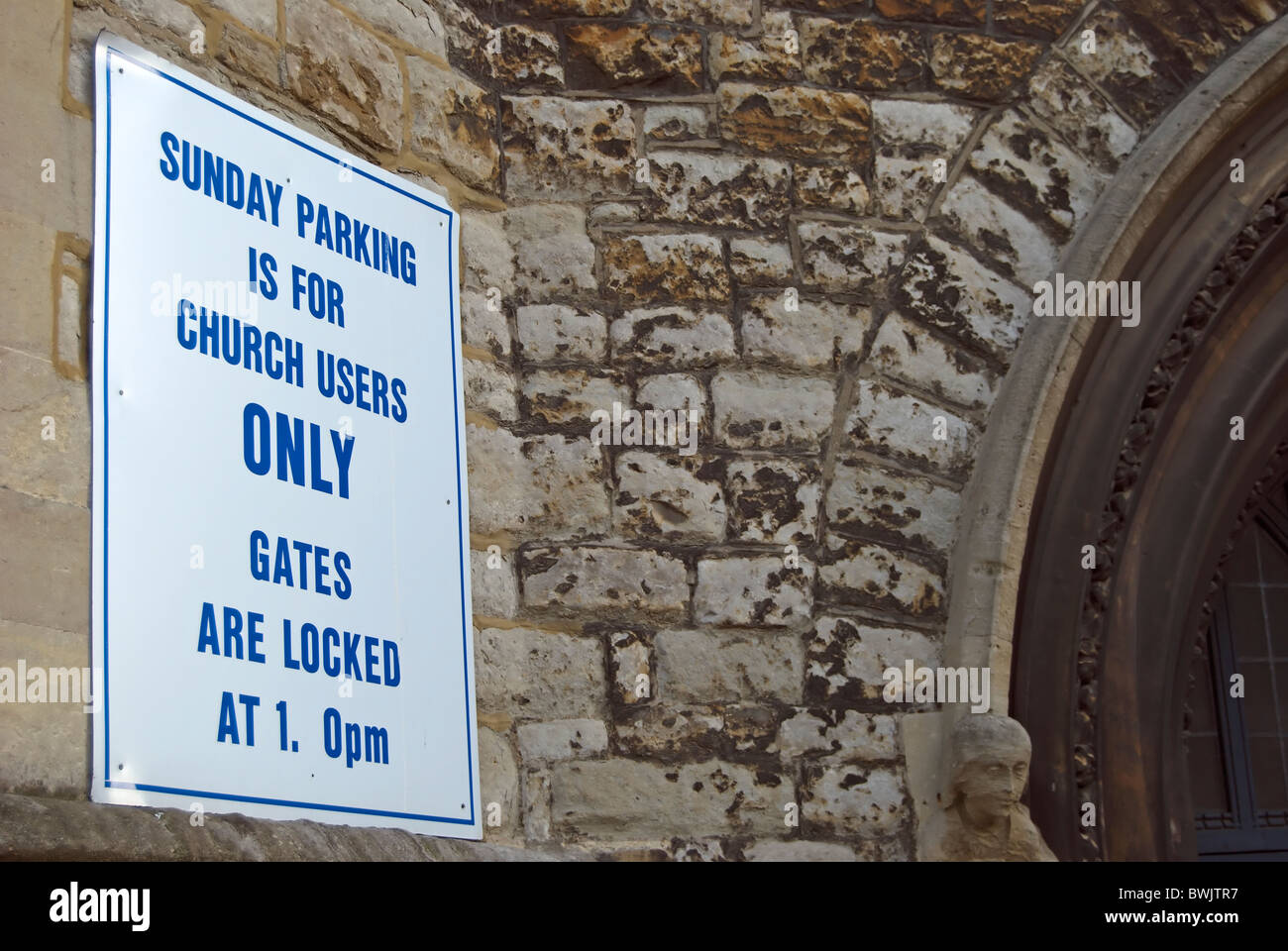 sunday parking for church users only sign at the church of christ the saviour, ealing, west london, england Stock Photo