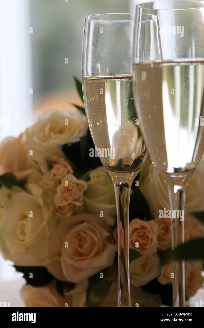 Bouquet and champagne glasses at a wedding Stock Photo