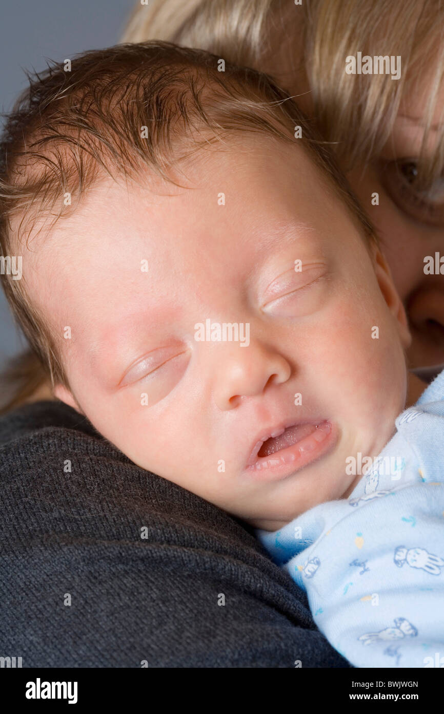 0-1 month 1-6 months 2 30-35 years 30s adult Adult Affection At home Babies Baby Care Caring Caucasian Ch Stock Photo
