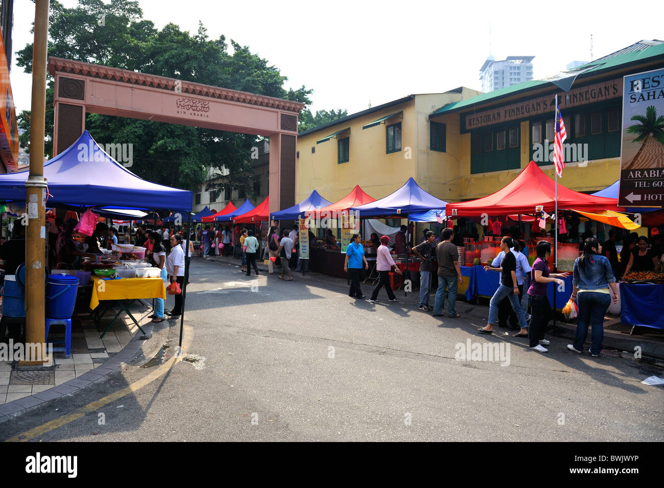 Food stalls selling to Malays in Kuala Lumpur during Ramadam, the food will be consumed at night. Stock Photo