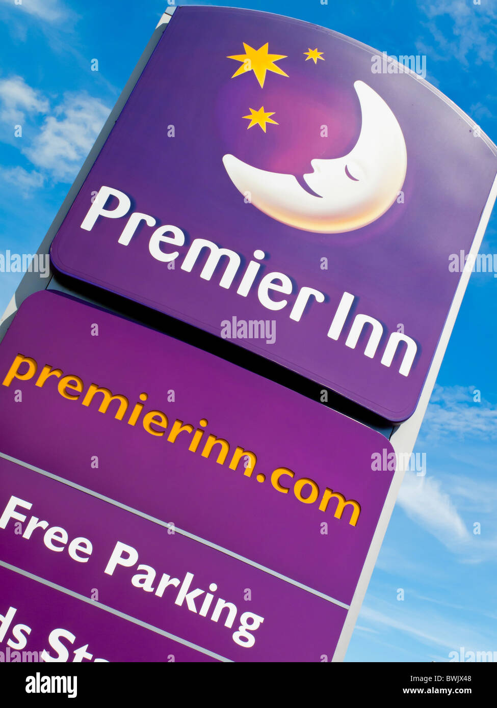 Premier Inn sign outside a budget hotel part of a chain in the UK owned by Whitbread Stock Photo