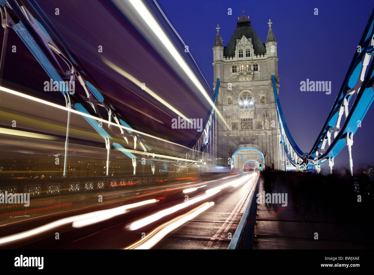 Tower Bridge at night with traffic trails Stock Photo - Alamy
