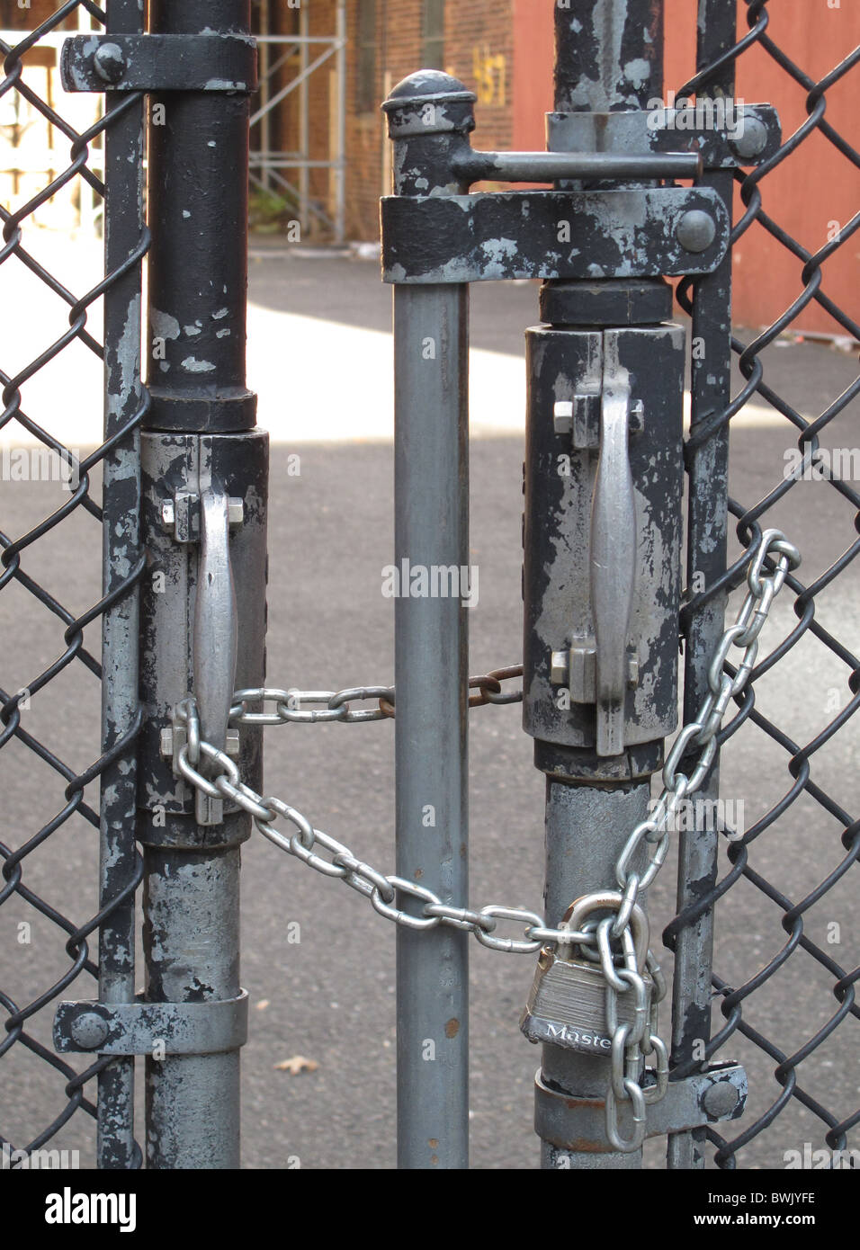 Chained gate for a yard in New York City Stock Photo