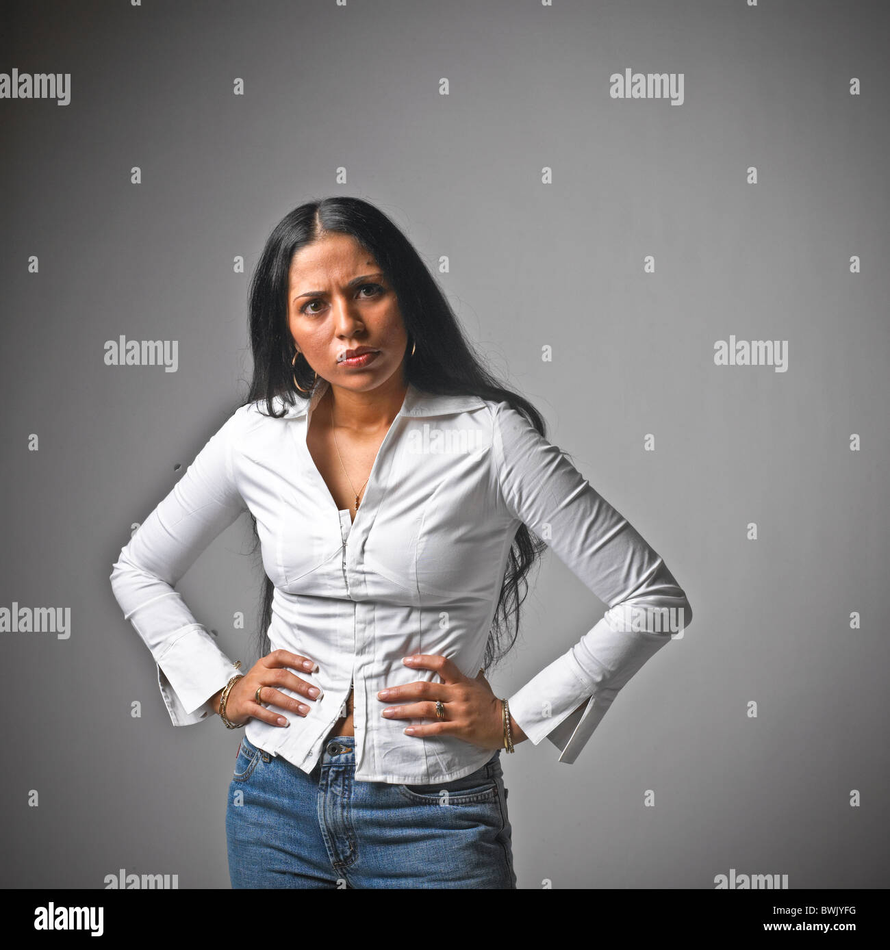 Woman hands on hips body language