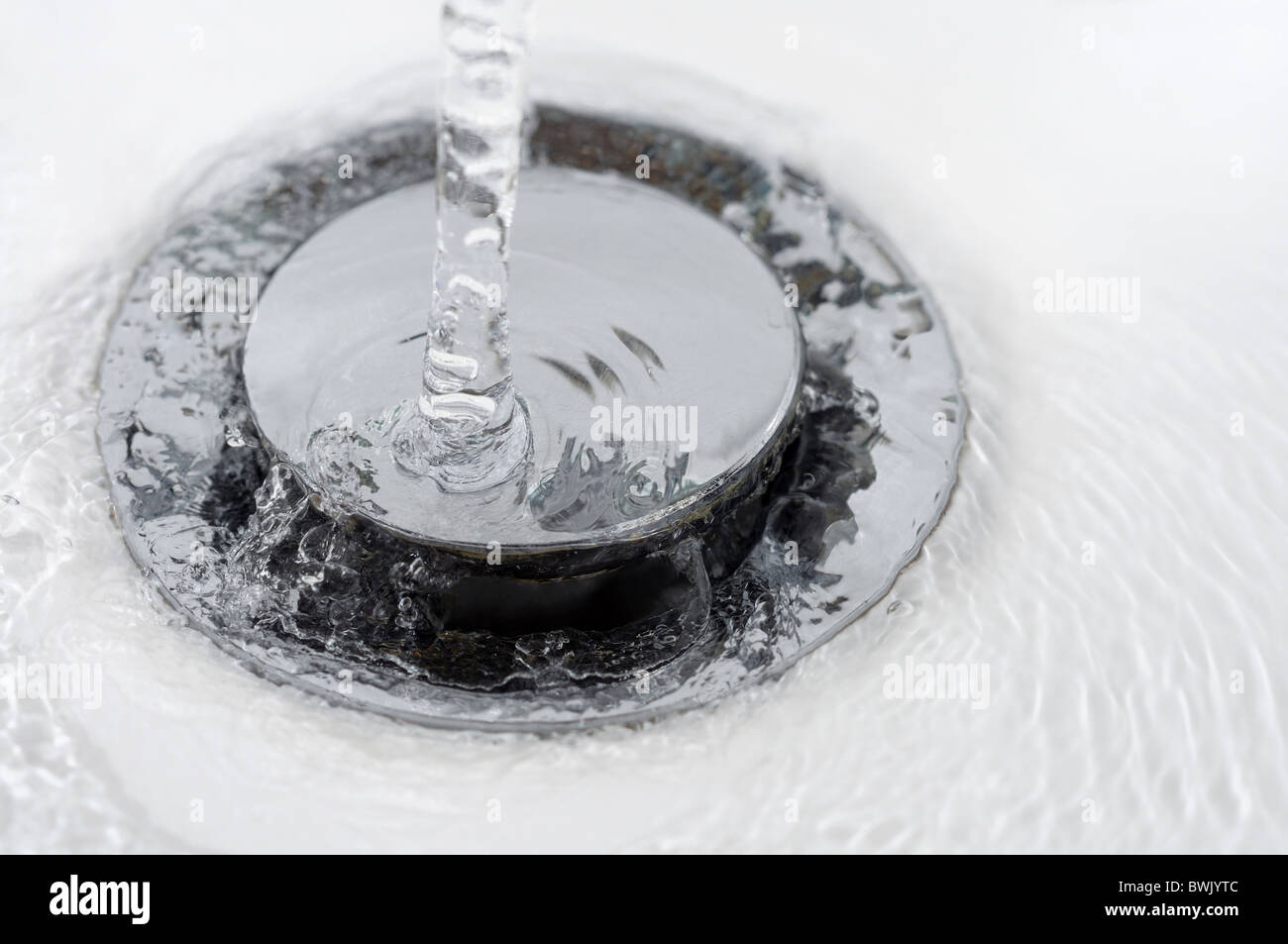 drain stopper plug water and washing basin detail Stock Photo