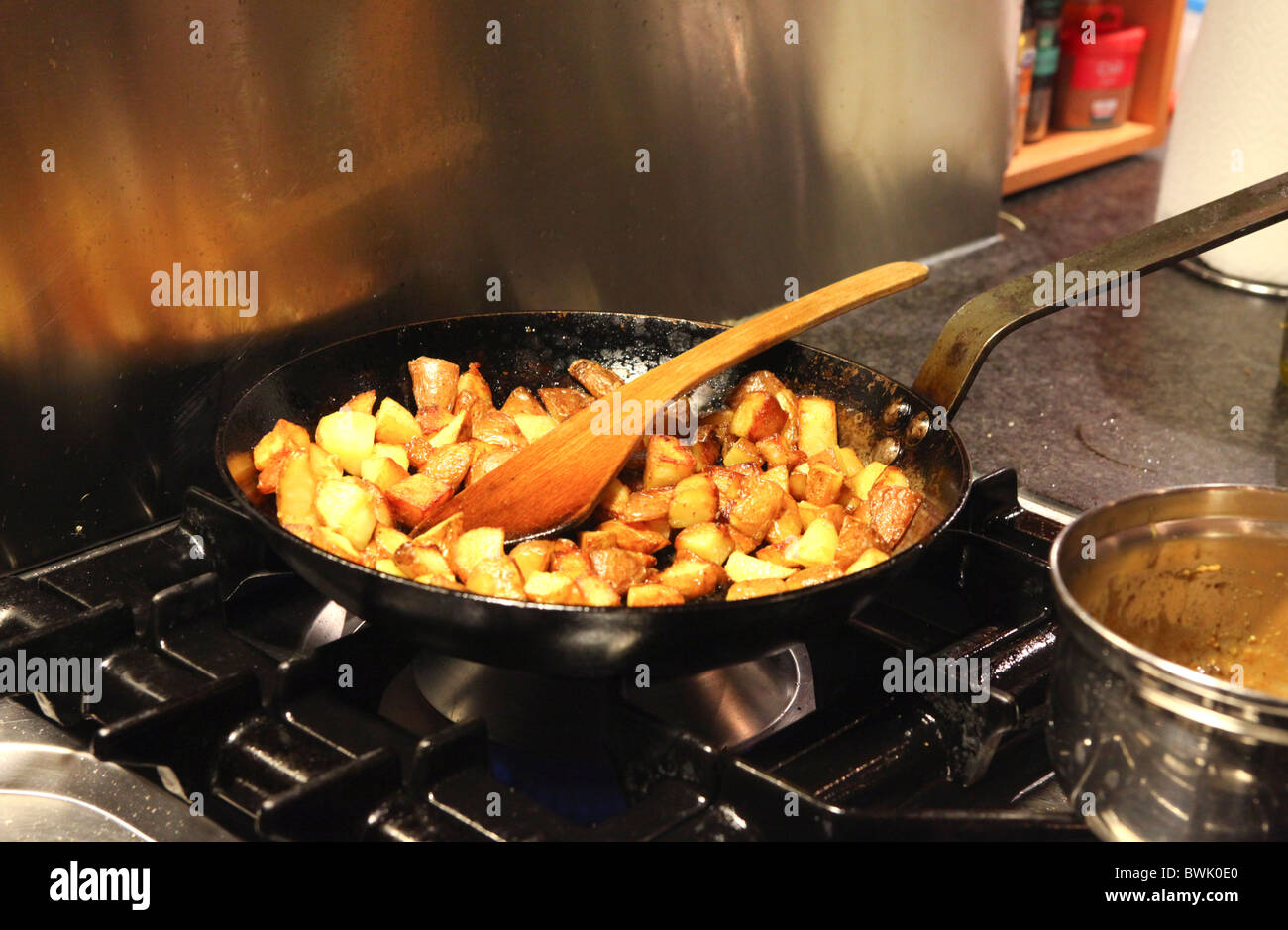 Baking potatoes in the kitchen Stock Photo Alamy